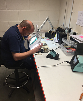 straightpoint engineer making a custom load cell